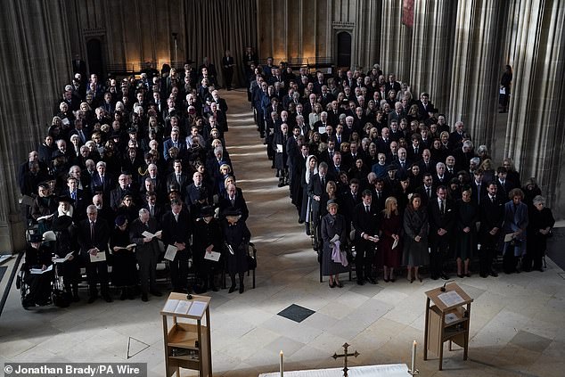Pictured: Guests attend a service of thanksgiving for the life of King Constantine of the Hellenes at St George's Chapel, Windsor Castle, Berkshire.