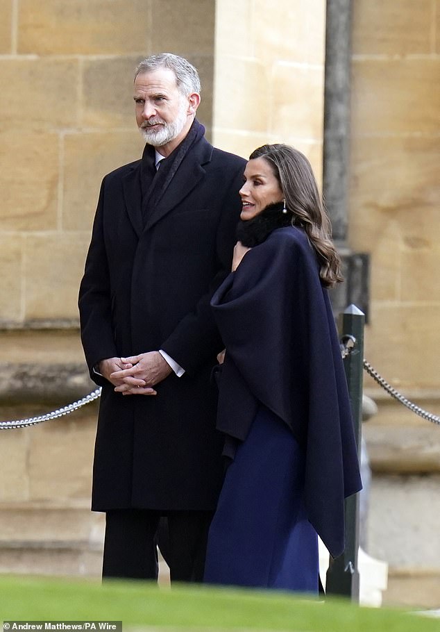 1709042829 584 Queen Letizia of Spain walks arm in arm with husband King Felipe