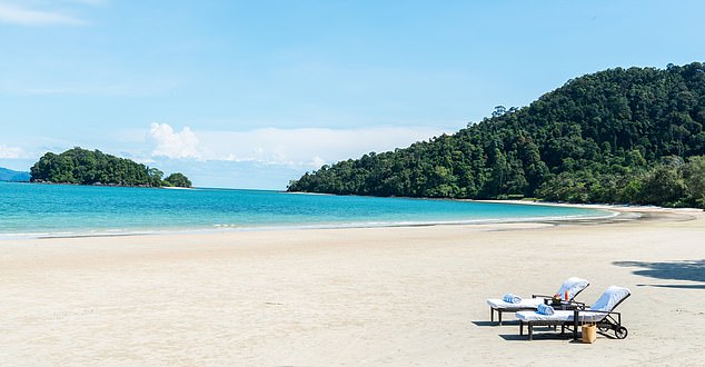 Prime spot: The Datai is tucked away in a crescent of sand in the Andaman Sea.