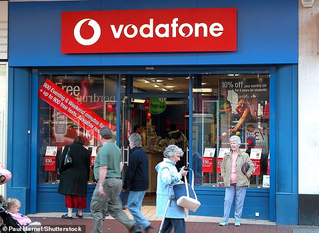 The first 3G voice call in the UK was made by Vodafone in April 2001, although its 3G mobile data network was only launched in 2005. Pictured is a Vodafone store in Bristol, 2003.