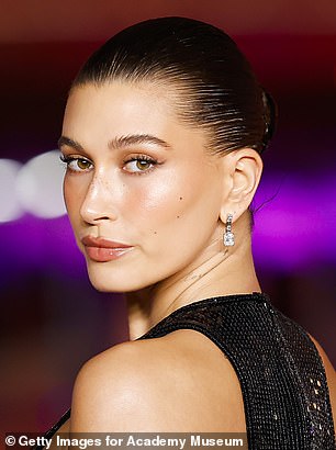 Hailey Bieber (pictured) has a low 'visual weight' face