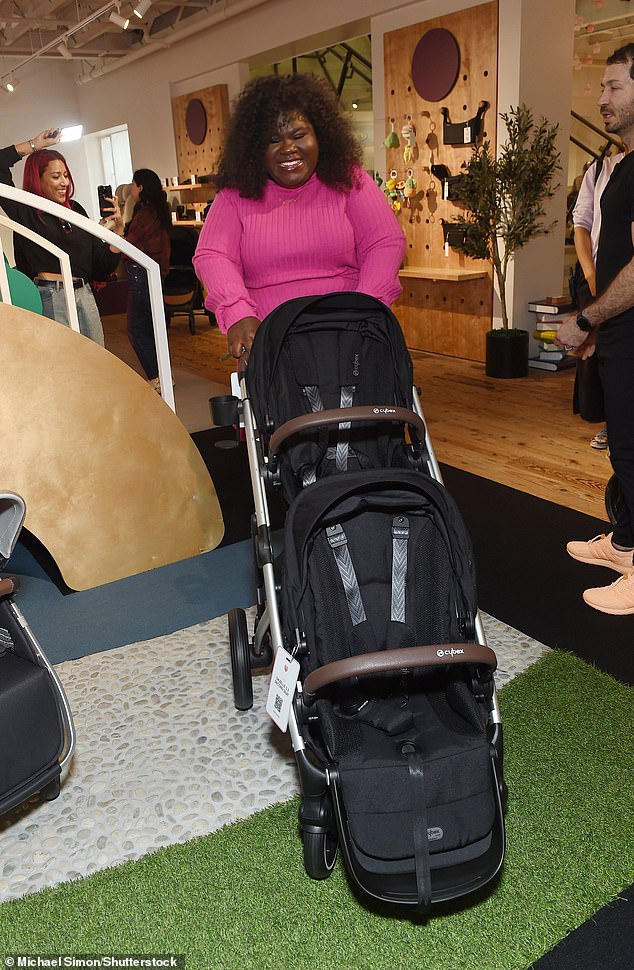 Gabourey looked delighted as she tried out a double stroller.