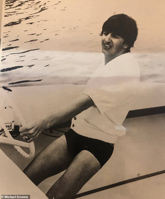 Drummer Ringo appears riding the boat in one clip with ease in his dark spandex and a white Cuban shirt.