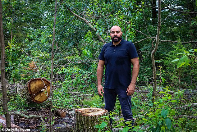 Samih Shinway, pictured, said he came home one day to find a team of men working on removing trees from his property.