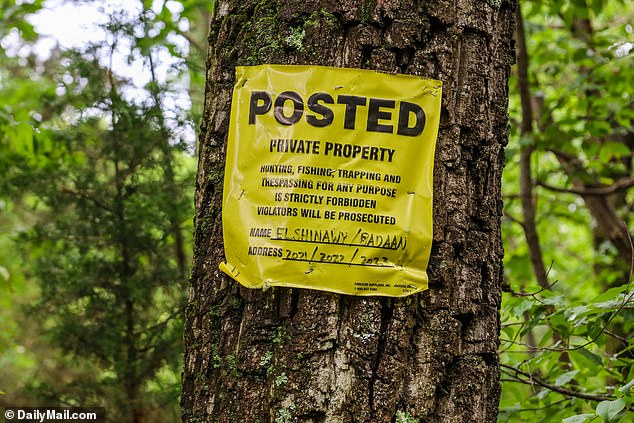 A private property sign is clearly visible taped to a tree where Haber is said to have paid the men to cut it down.