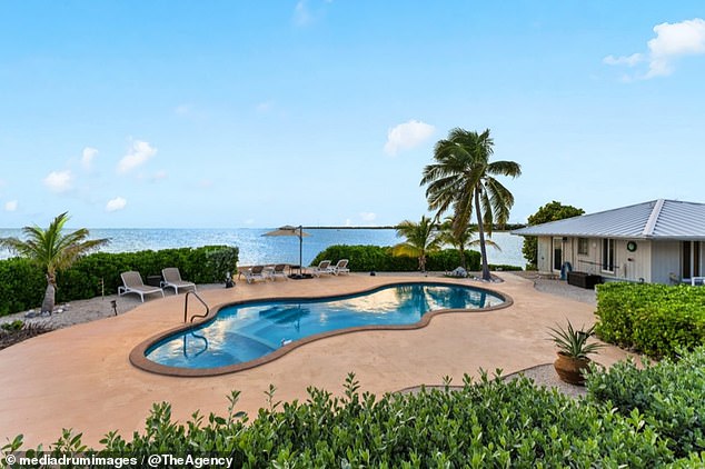 The residence has 800 feet of ocean frontage and has a swimming pool.