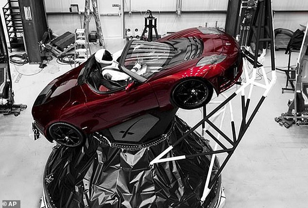 The 'Starman' mannequin sat behind the wheel of the Tesla Roadster before taking off from the Kennedy Space Center at Cape Canaveral on February 6, 2018.