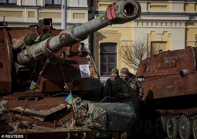 Ukrainian servicemen visit exhibition showing destroyed Russian military vehicles