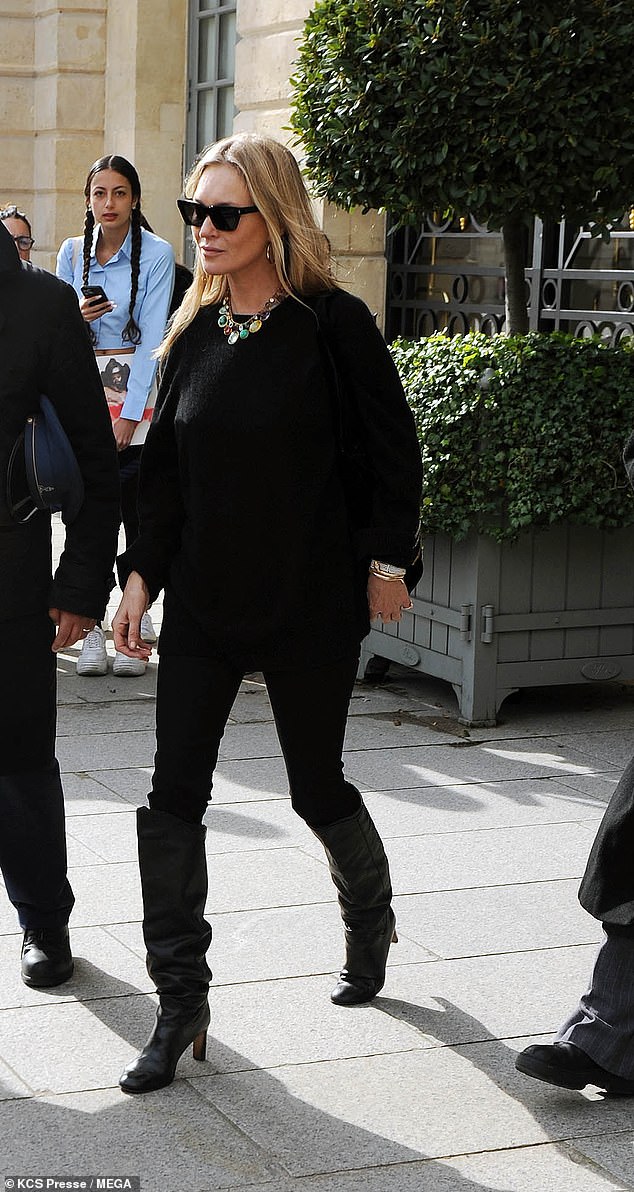 The model, 50, appeared in good spirits at the outing as she donned a black jumper along with a pair of matching skinny jeans.