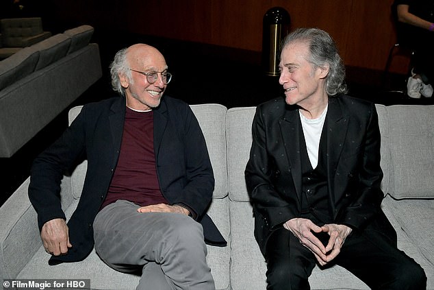 Lewis played a fictional version of himself on Curb Your Enthusiasm; Pictured with Larry David (left)