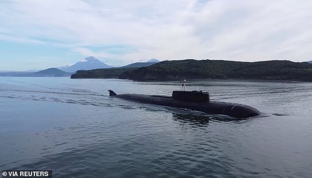 A still image from a video, released by the Russian Defense Ministry, shows what is said to be a Russian nuclear-powered submarine sailing during the Umka-2022 military exercises in the Chukchi Sea in September 2022.