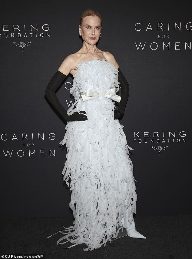 Nicole Kidman showed off her inner ice queen in an embellished Balenciaga dress, which she paired with long black gloves.