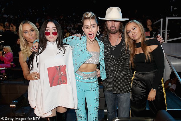 Billy Ray and Tish's divorce is said to have caused a rift between their children, and sources say Miley (seen with her parents and siblings Noah and Brandi in 2017) stayed close to her mother, while Noah took sides his father's.
