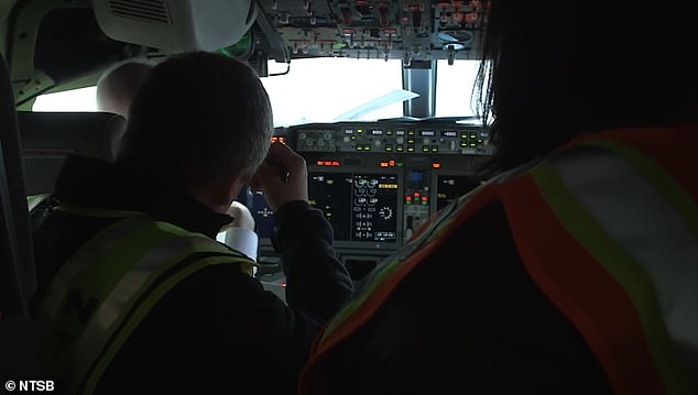 NTSB investigators are in the cockpit as they investigate what caused a plug covering a spot left by an emergency door to tear off the plane while flying at 16,000 feet.