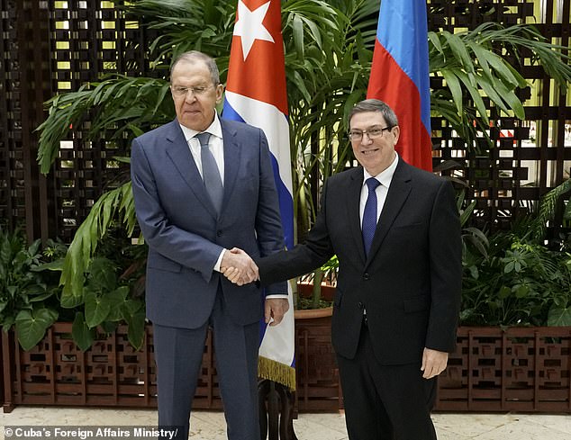 Russian Foreign Minister Sergei Lavrov (left) made no secret of his trip to the island and posed for photographs with Cuban Foreign Minister Bruno Rodríguez.