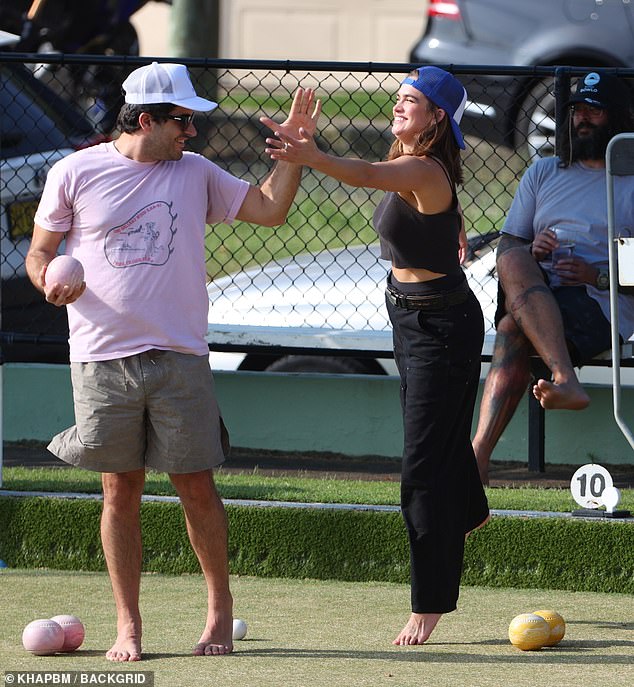 Stormi was seen playfully interacting with friends during the game.