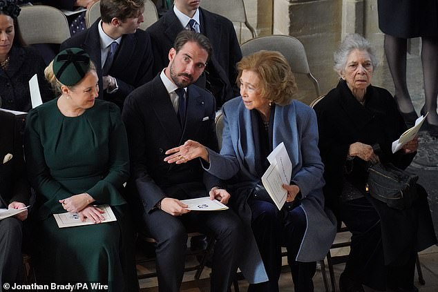 King Constantine's sisters, Queen Sofia of Spain and Princess Irene of Greece and Denmark (far right), seated next to Princess Theodora and Prince Philip of Greece.