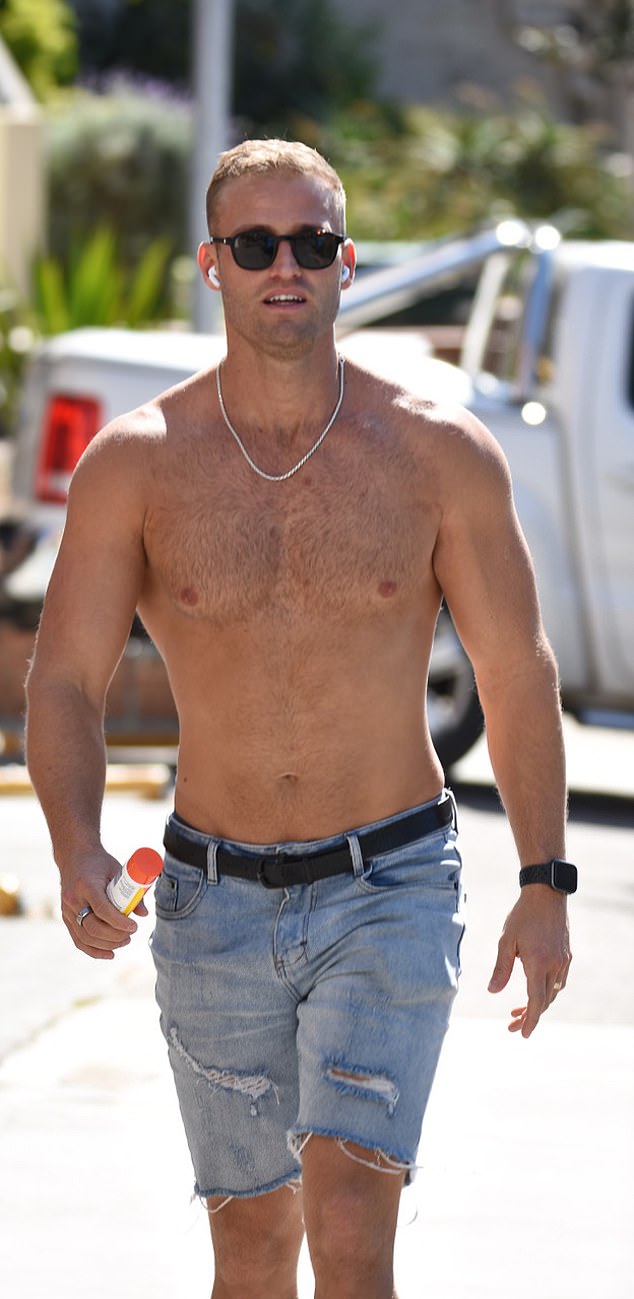 Tim, 31, made sure his well-honed physique was on full display as he led the charge in a simple pair of denim shorts. He accessorized his look with a pair of designer sunglasses and added a statement chain around his neck.
