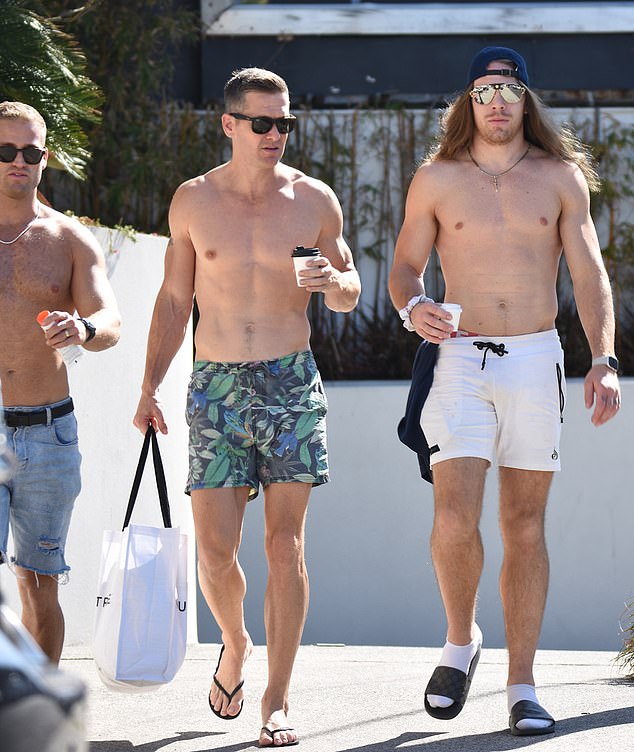 The boys headed to the beach to enjoy a nice day off after filming.