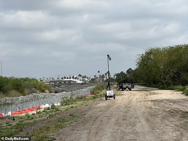 Members of the Texas National Guard patrolling the border: Crossings have decreased since Republican Governor Greg Abbott installed fences.