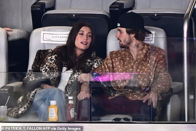 The Biebers appeared to be in good spirits as they sat next to each other in the VIP section of Allegiant Stadium in Las Vegas watching Super Bowl LVIII on February 11.