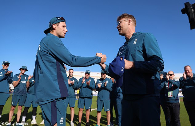 Flintoff (right) presented Tom Hartley with his ODI cap against Ireland in September
