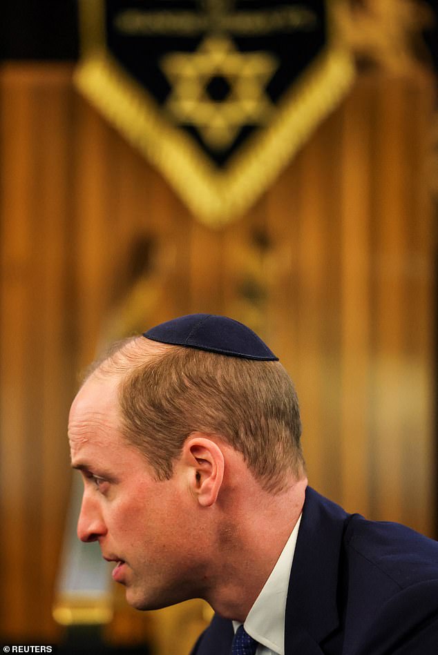 Prince William wears a yarmulke while visiting Western Marble Arch Synagogue