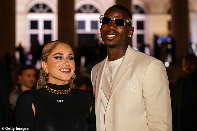 Pogba, pictured with his wife Zulay, has an interest in fashion, something he could pursue