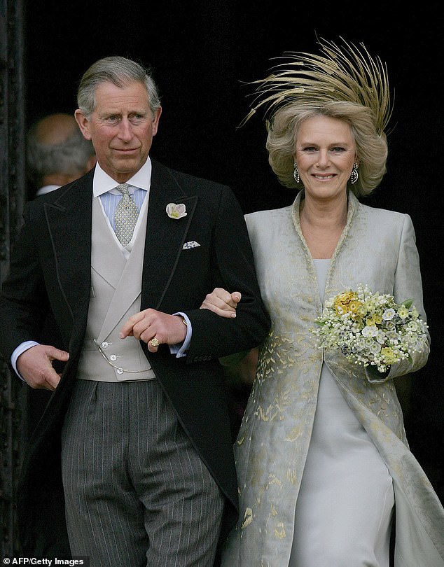 Wedding day: Charles and Camilla leave St George's Chapel following the blessing of their marriage at the church in August 2005. The photo is framed at Clarence House.