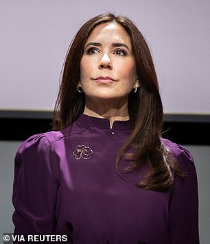 The royal completed her ensemble with delicate earrings.