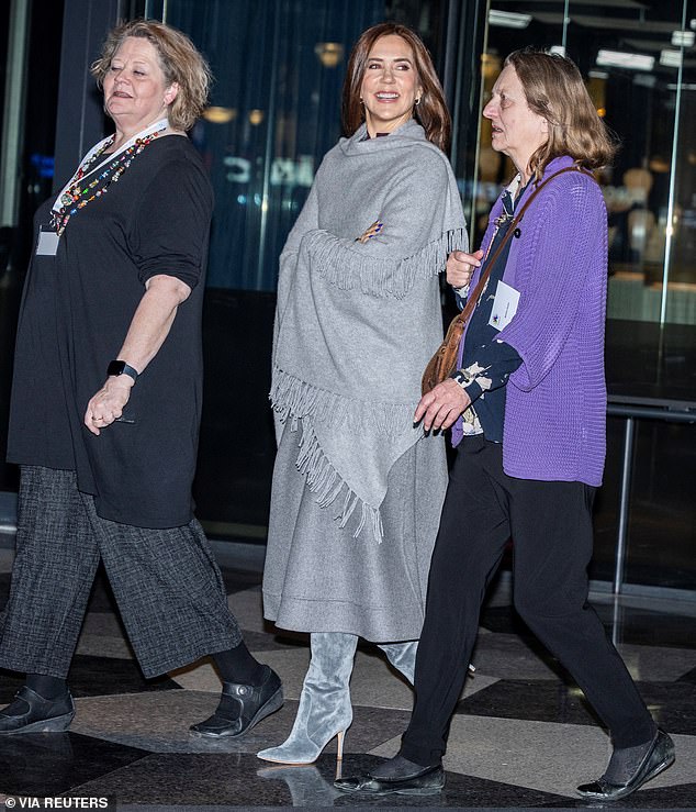 Mary kept the cold at bay in a gray shawl and knee-high suede boots as she attended today's event.