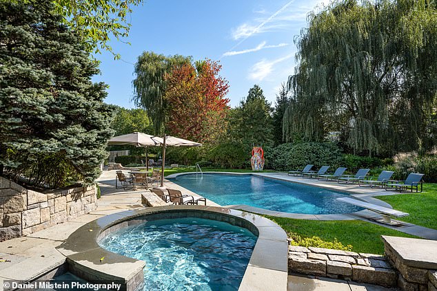 The outdoor area highlights a pool, spa, pickleball court and gazebo, with bluestone walkways surrounding the property.