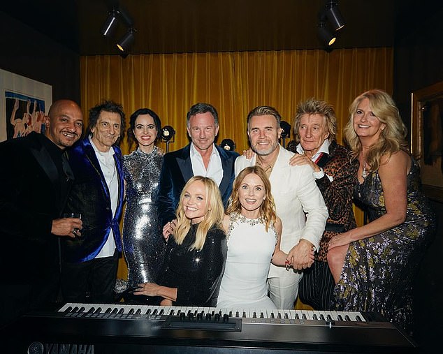 (Back row, from left) Jade Jones, Ronnie Wood and his wife Sally, Christian Horner, Gary Barlow, Rod Stewart, Penny Lancaster.  (Front row) Emma Bunton and Geri Halliwell on her 50th birthday