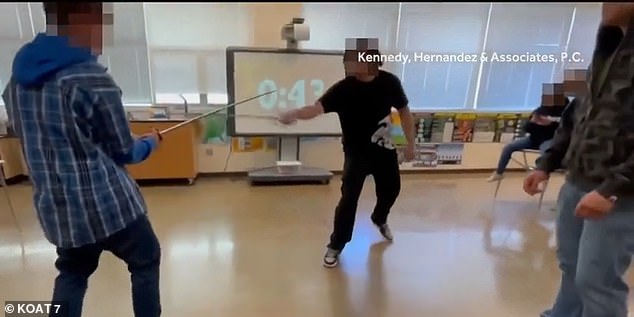 Video filmed by the girl shows two classmates wielding swords at each other seconds before their fateful combat in the Volcano Vista High School classroom.