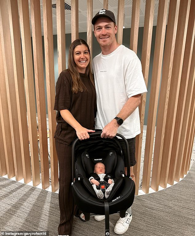 Gary Rohan has confirmed he has welcomed a baby with his wife Madi Bennett after his miscarriage heartbreak, and shares a photo of them carrying their newborn son home (above)