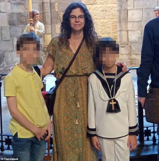 Two Russian children have been arrested in Spain on suspicion of having killed their adoptive mother, who was found last night tied, gagged and stabbed in the trunk of a car.