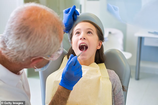 A survey of 53,073 children found that 16 percent had signs of cavities and on average two rotten teeth (file photo)