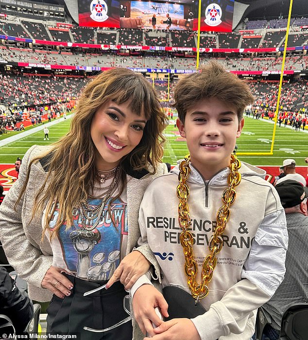 Alyssa Milano was criticized as a 'rich beggar' for attending Super Bowl LVIII at Allegiant Stadium in Paradise, NV on Sunday with her 12-year-old son, Milo Thomas Bugliari, following her GoFundMe scandal.