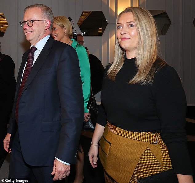 Labor leader Anthony Albanese and his partner Jodie Haydon arrive to meet members of the Italian community at the Marconi Club on Wednesday (pictured)
