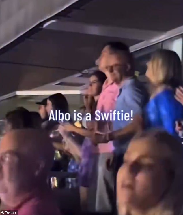 Mr Albanese (blue top) is seen at Taylor Swift's show in Sydney, between his son Nathan and fiancée Jodie Haydon.
