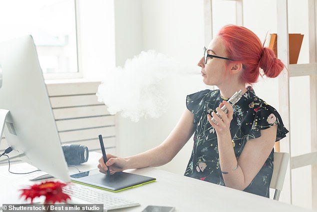 Australian workers have revealed the most frustrating habits of their Gen Z colleagues - one of them said they noticed a young worker vaping at his desk (file image)