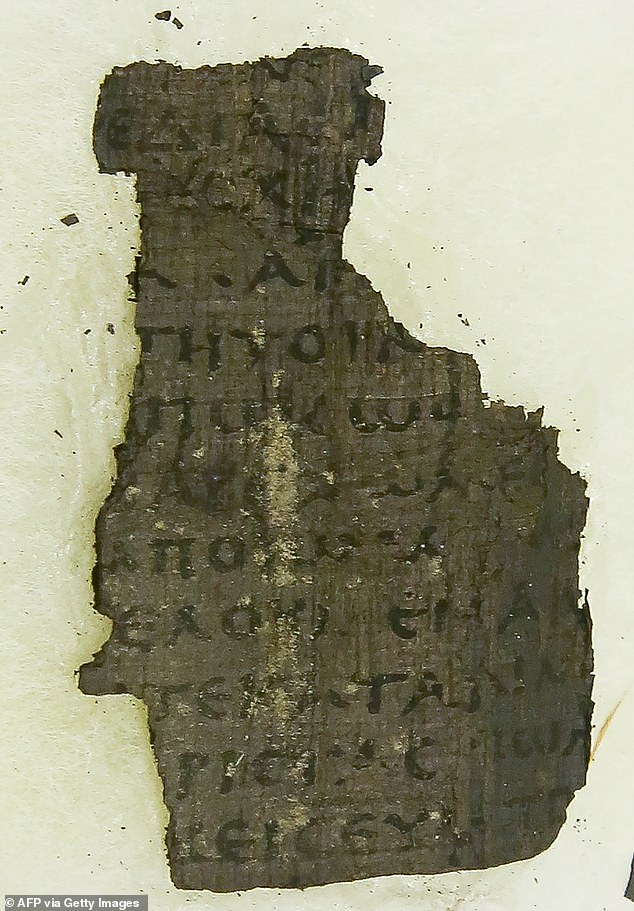 A fragment of a Herculaneum scroll shows the marks in the fragile material.