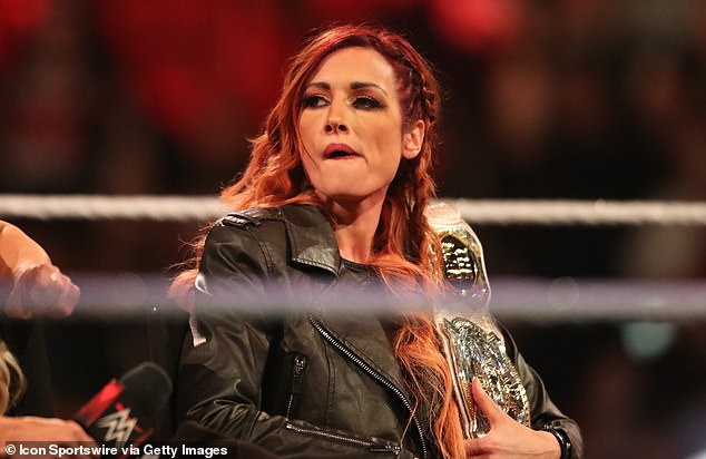 Becky Lynch (pictured) has opened up about rekindling her relationship with Charlotte Flair