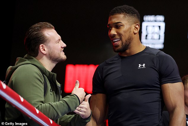 Anthony Joshua teamed up with Ben Davison (left) for his final fight against Otto Wallin