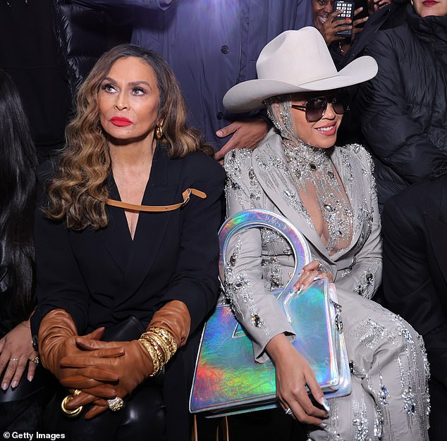 The superstar, 42, sizzled in a sparkly silver suit and was accompanied by her mother, Tina Knowles.