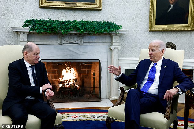 President Joe Biden meets with German Chancellor Olaf Scholz in the Oval Office on Friday