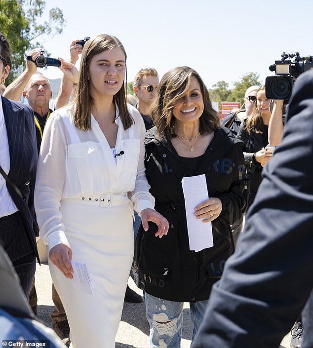 Brittany Higgins (left) first went public with her accusations against Bruce Lehrmann in an interview with Lisa Wilkinson (right).  They appear together at the March4Justice rally in March 2021.