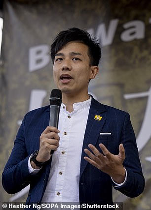 Finn Lau, exiled Hong Kong activist and founder of Hong Kong Liberty, speaks during the rally at Parliament Square in June last year.