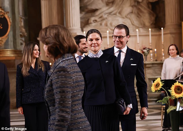 Crown Princess Victoria arrived today with the Swedish royal family for a prayer for peace on the second anniversary of Vladimir Putin's invasion of Ukraine.