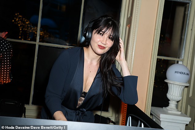 During the night, the DJ hopped onto a deck set to entertain party guests, including Made In Chelsea's Sophie Herman and Amber Le Bon.